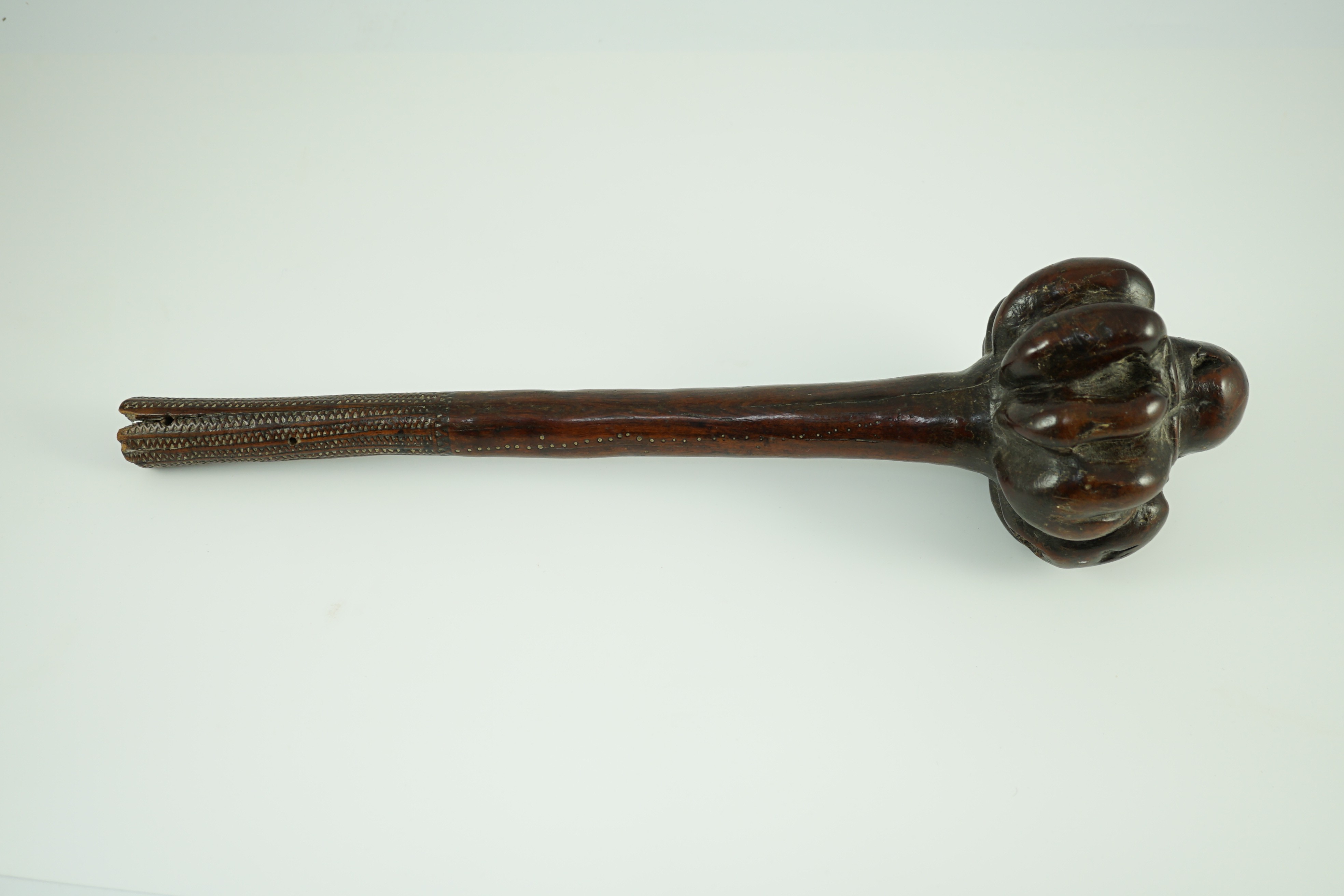 A Fijian hardwood throwing club, 40cm long